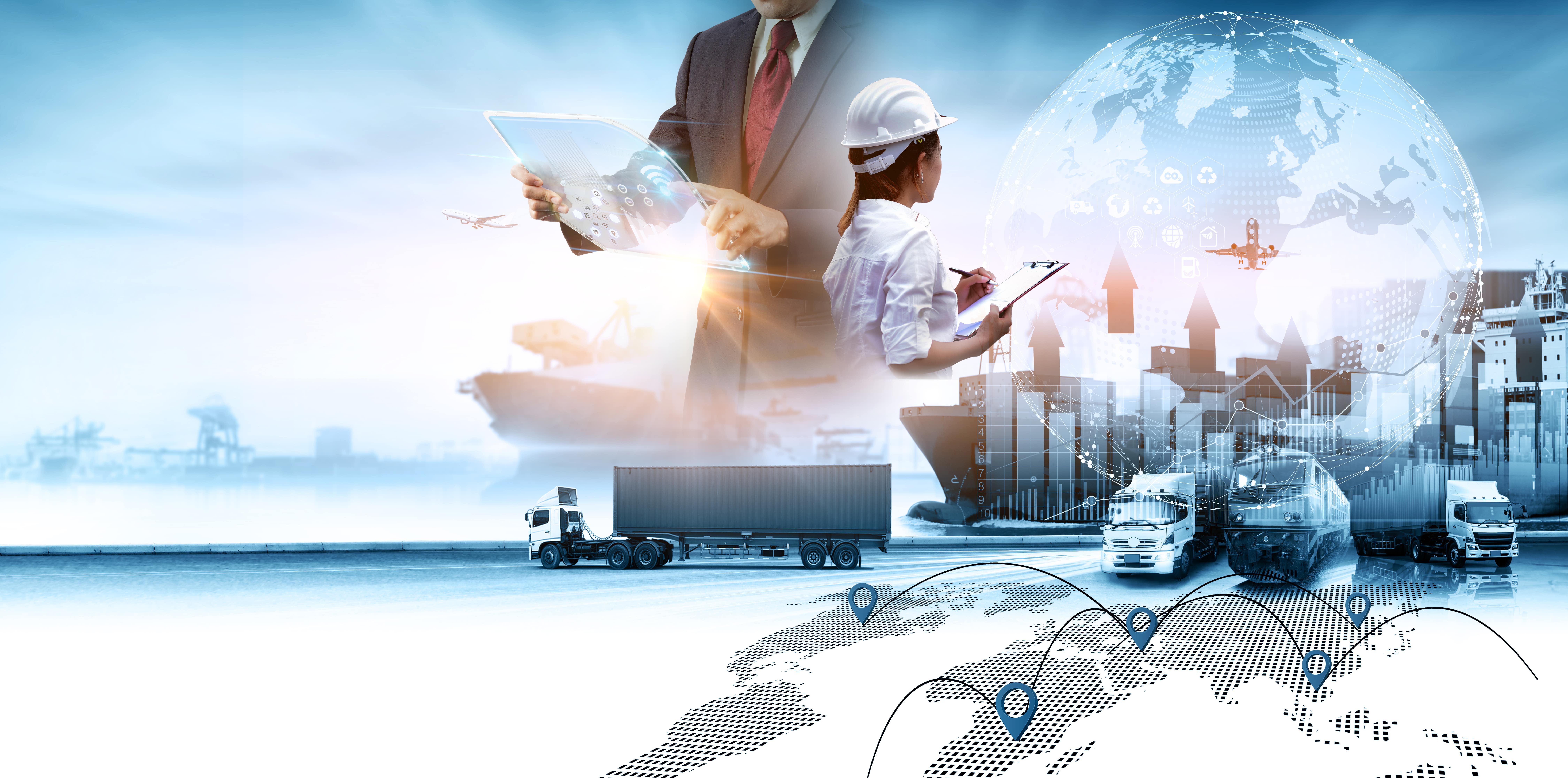 a man in a suit and tie standing in front of a world map