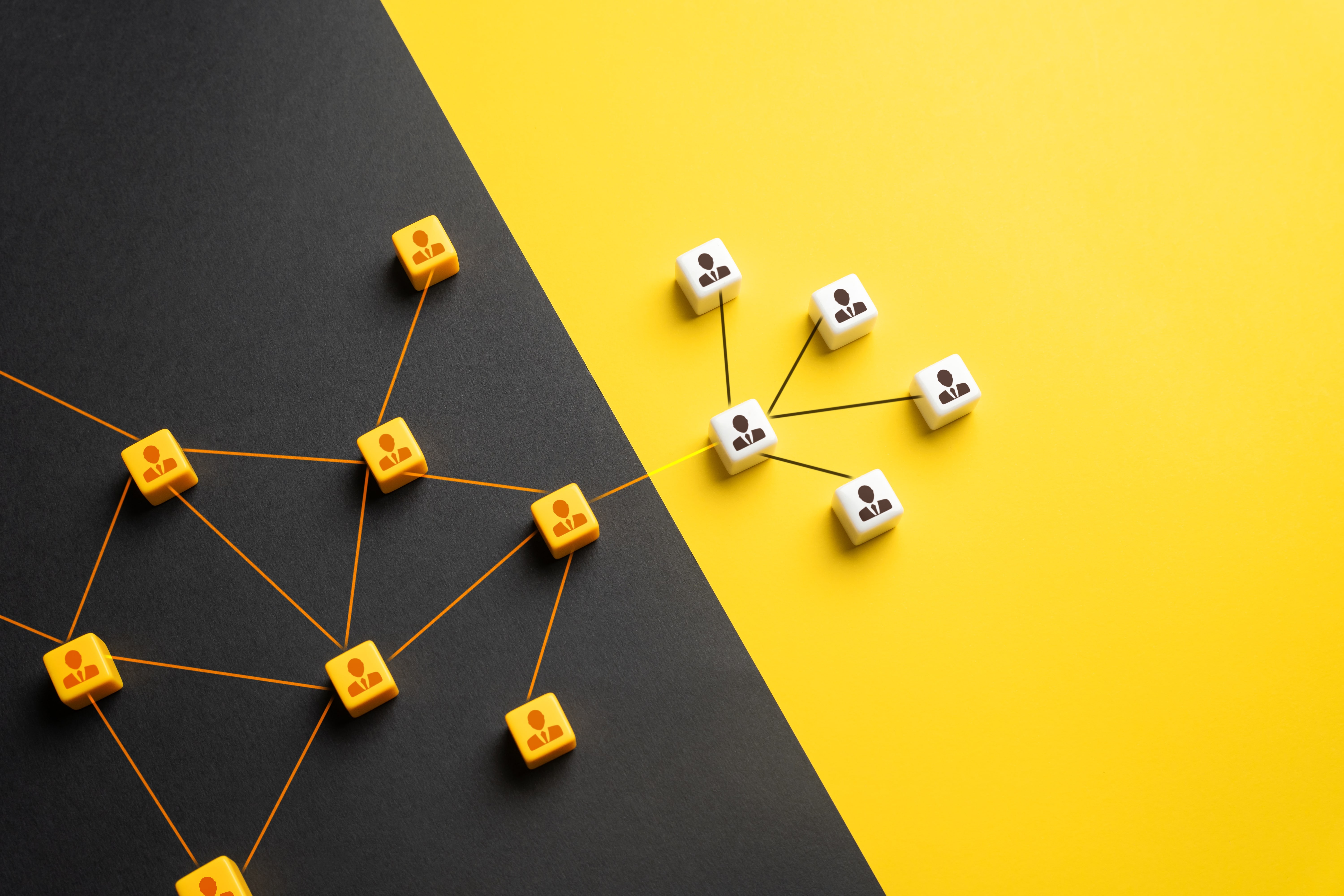 a group of yellow and white dices sitting on top of a black and yellow