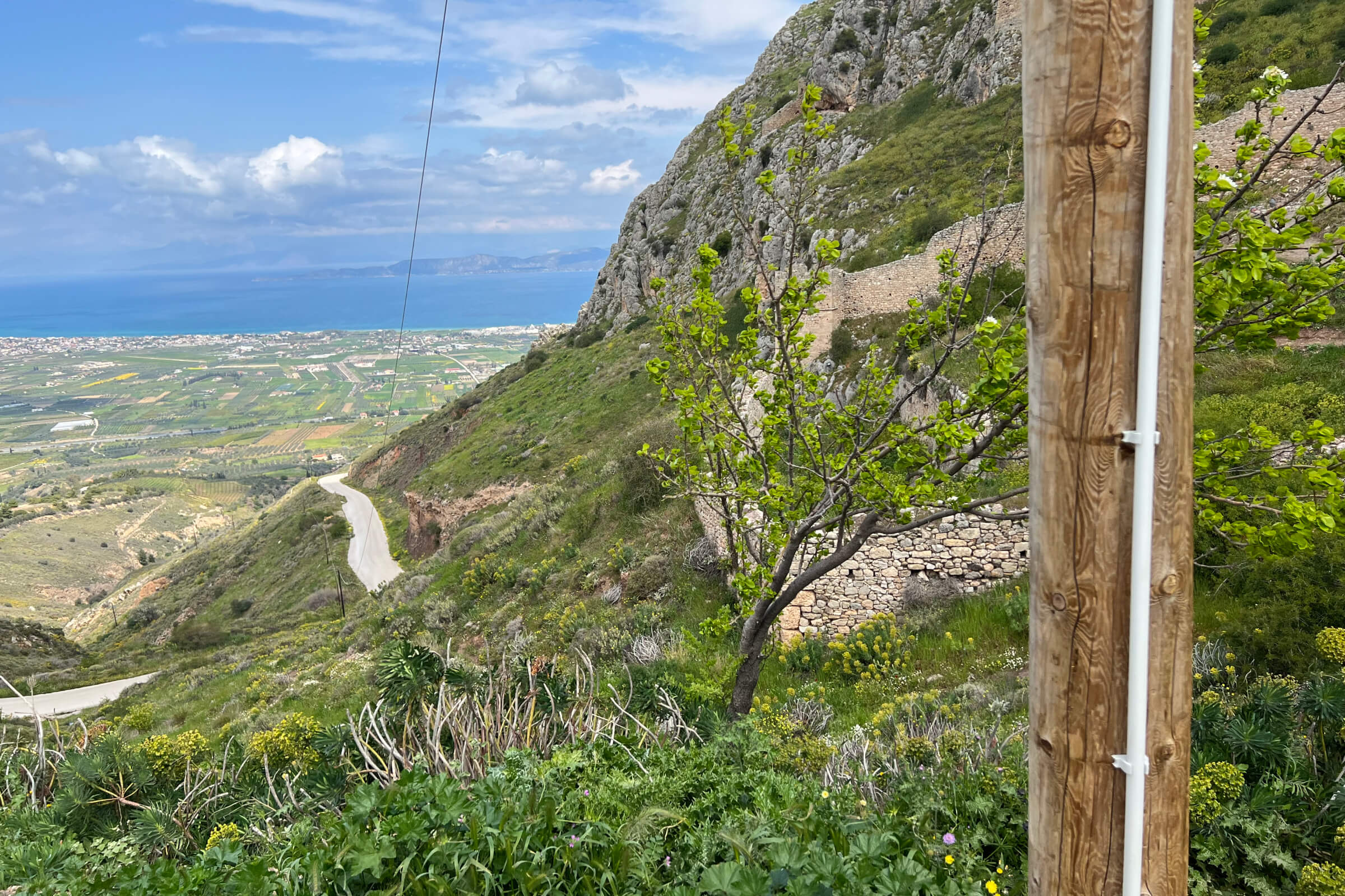 a view of a mountain with a road going up the side of it